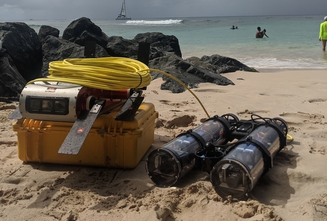 LoCO AUV on the beach with Aqua AUV.